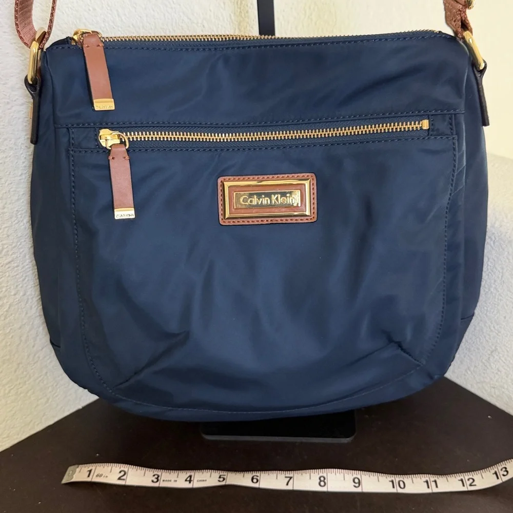 VINTAGE Calvin Klein Navy Messenger/ Crossbody Bag with Tan Adjustable Strap. - Picture 12 of 16